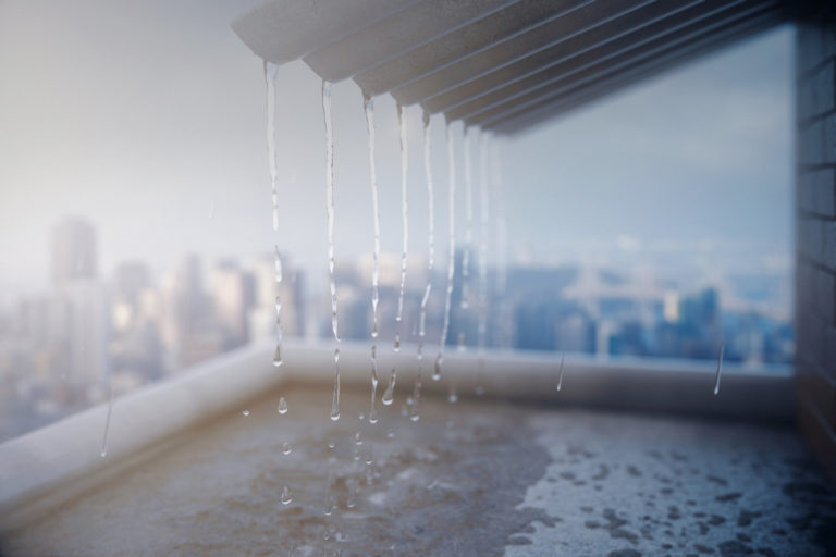 Rain Pouring Off Roof